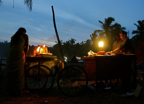 Food carts at Kovalam at dusk.